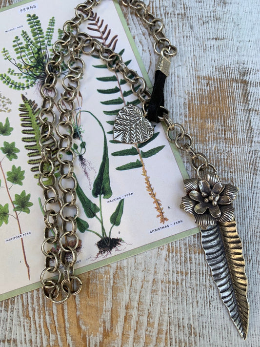 Fine silver leaves and a detailed flower on hand-stamped Thai silver chain with a leather loop clasp. Gardener gift. .