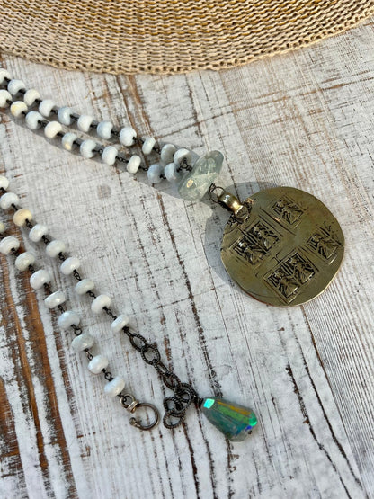 African opal chain with an artisan made bronze pendant and fluorite accents. Long, adjustable necklace.