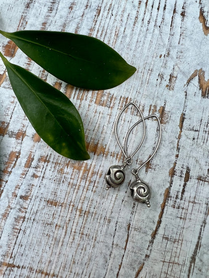 Shark eye snail fine silver earrings. Long, dangle earring.