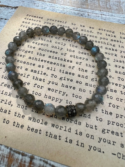 Faceted Labradorite beads surround a pavé diamond bead. Handmade and OOAK. Stretchy, fits most wrists 7”).
