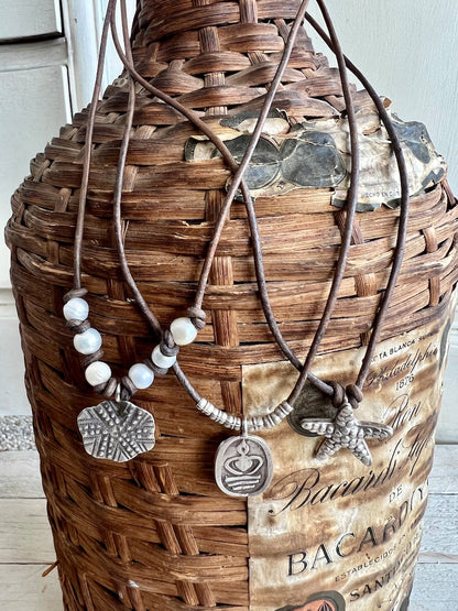 Fine silver sand dollar on brown leather choker 16”. Casual everyday boho necklace. Beach lover gift.