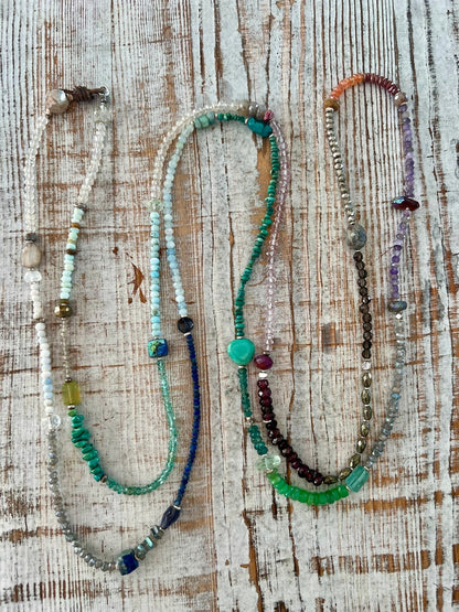 Extra long multi wrap bracelet or necklace of assorted gemstones. Wear with anything. 67” long.
