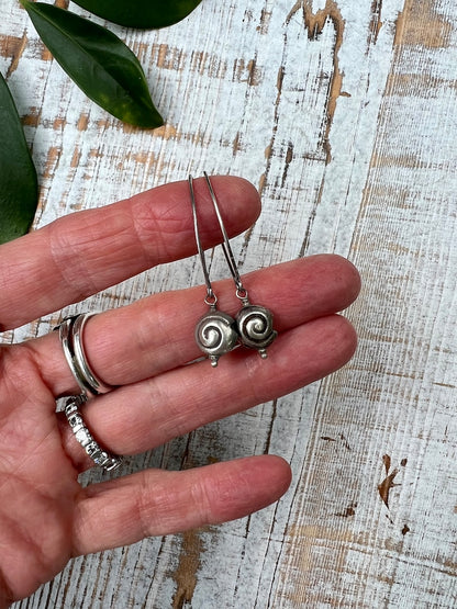 Shark eye snail fine silver earrings. Long, dangle earring.