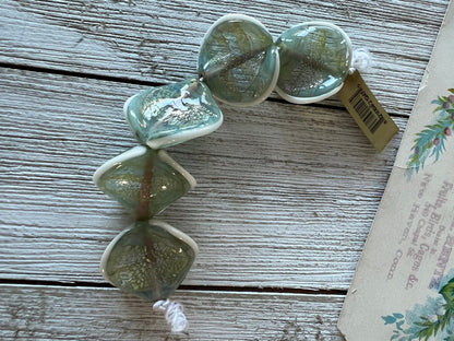 Destash.  Blue green beachy Lampwork glass shell beads