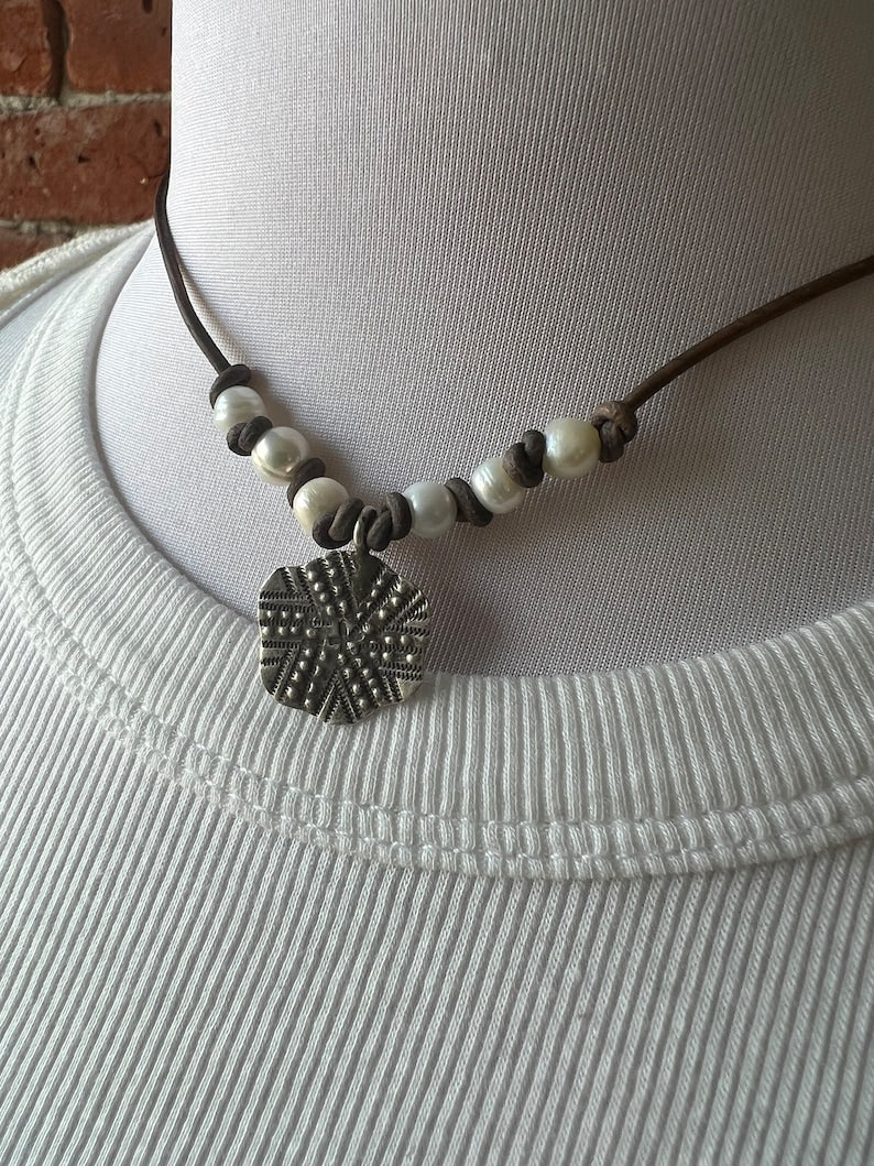 Fine silver sand dollar on brown leather choker 16”. Casual everyday boho necklace. Beach lover gift.