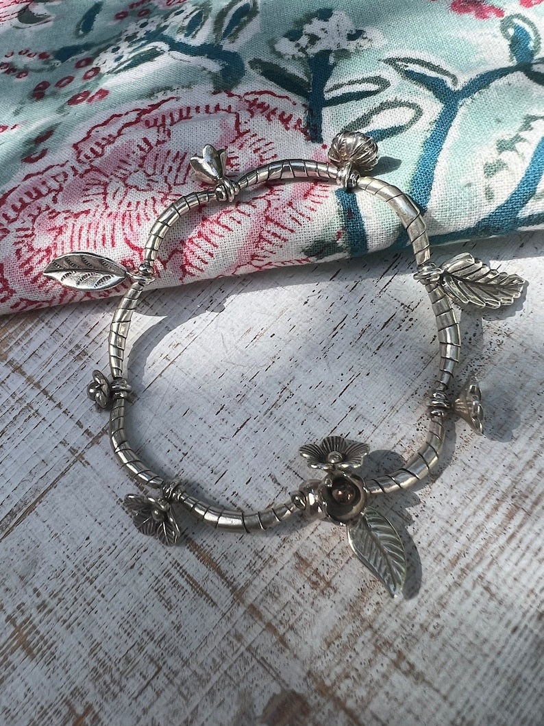 Fine silver garden flowers stretch bracelet for gardeners, nature lovers, and flower lovers. OOAK. Non tarnish 98%+ silver.