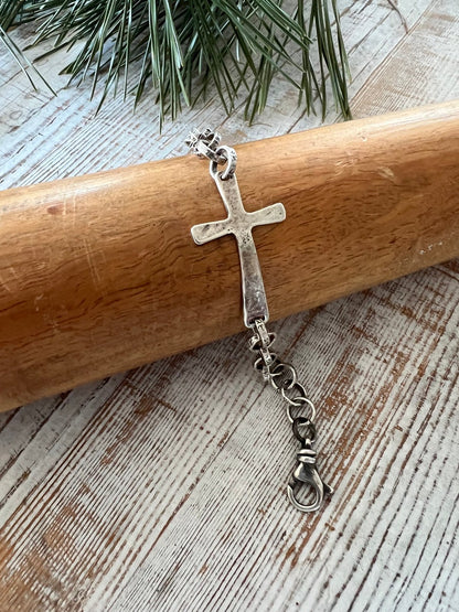 Hammered sterling cross on stamped fine silver chain. Sterling swivel lobster clasp. Great addition to your stack. 7” silver