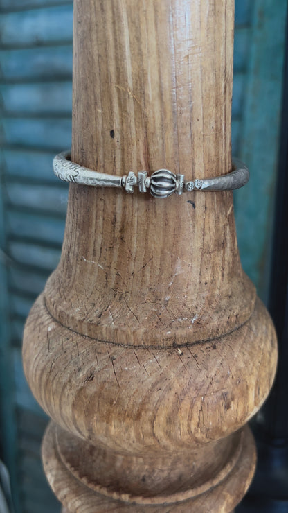 Fine silver bangle with stamped flowers. Bohemian stretch stacker bracelet.